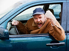 Angry man in car.